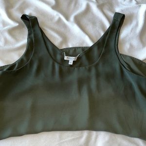 Green sleeveless blouse